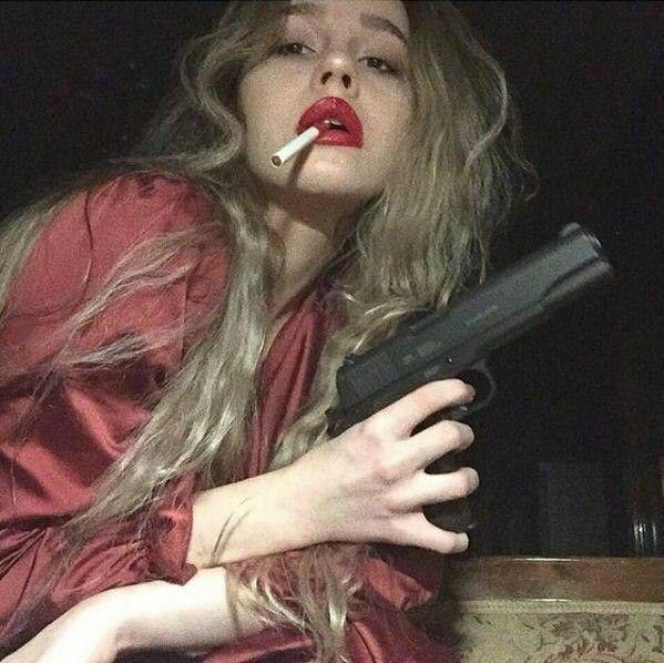 Women Smoking Cigarettes — 24