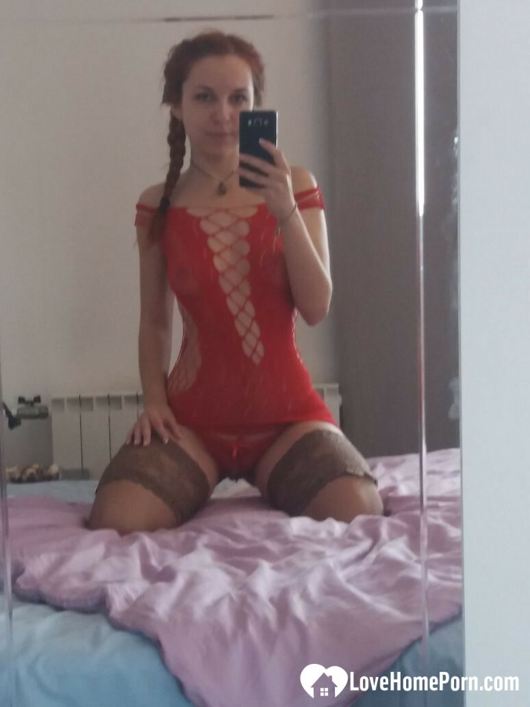 Smoking redhead teases in stockings in the bedroom — 7
